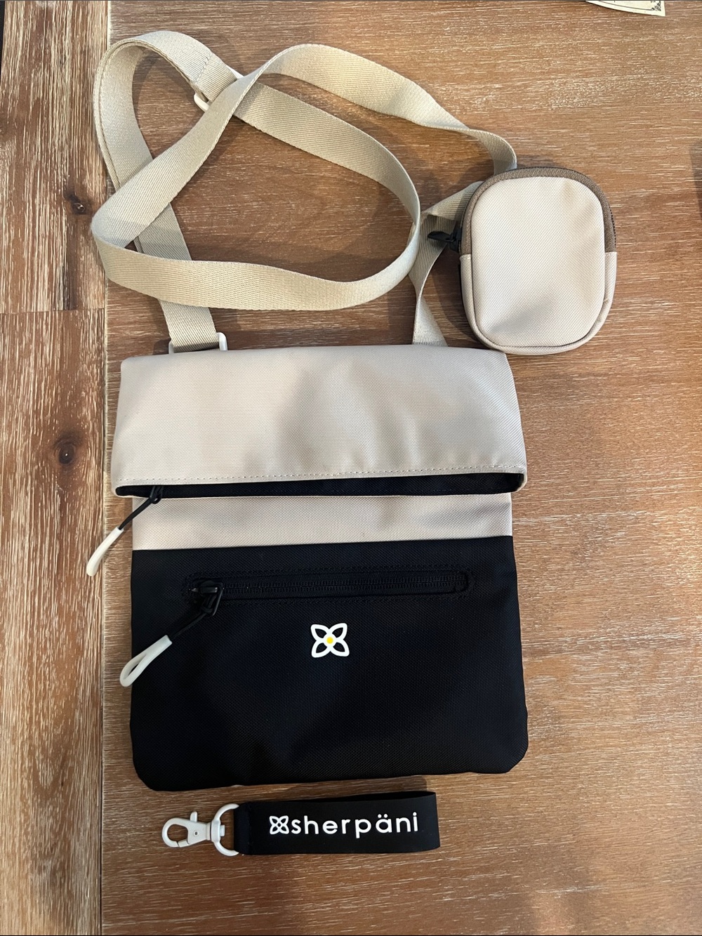 Sherpani Beige and Black Crossbody with Mini Pouch